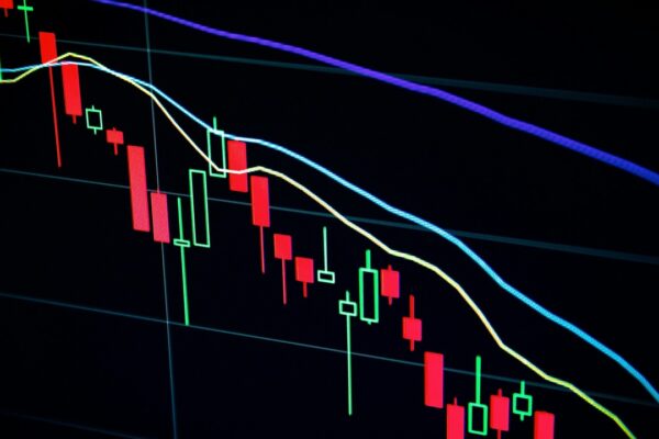 Trader on Binance tablet - Maxim Hopman / Unsplash
