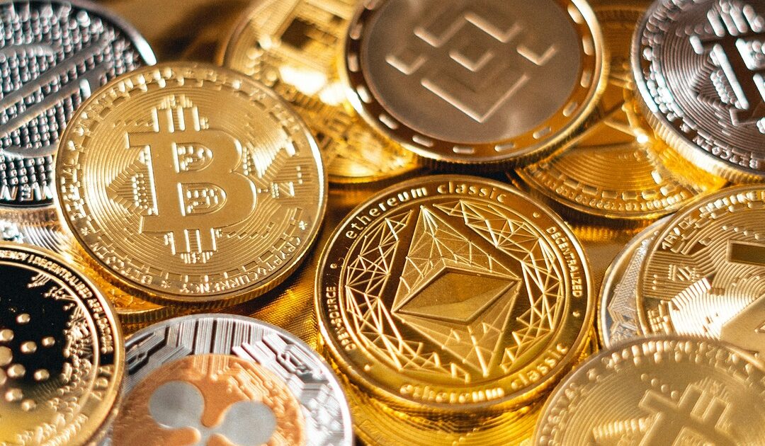 Pile of golden BTC coins - Art Rachen / Unsplash