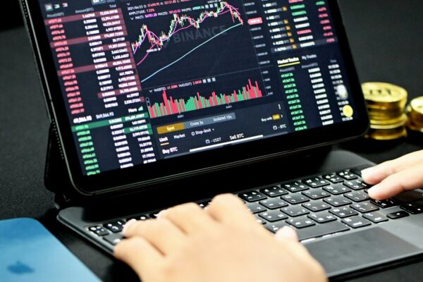 BTC coin on red/green chart - Kanchanara / Unsplash