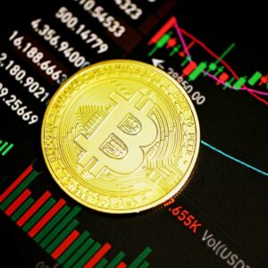 Single BTC coin warm light - Kanchanara / Unsplash